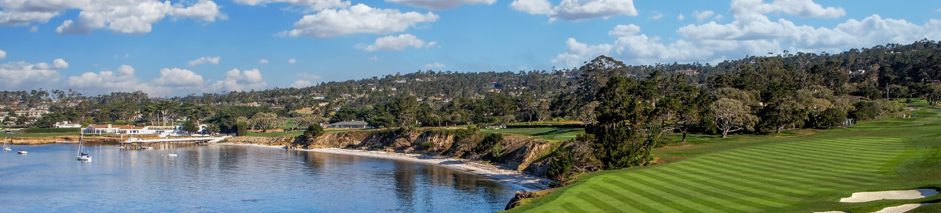 Golf course along shoreline.
