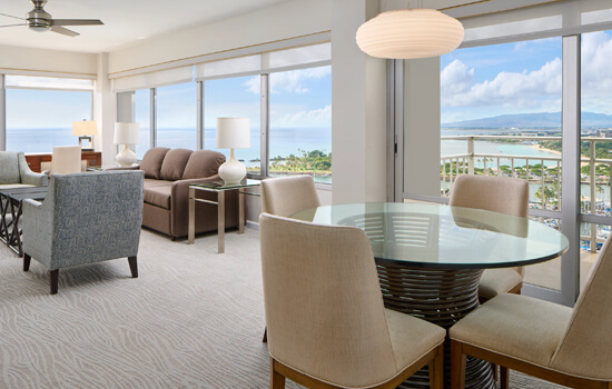 Ilikai suite living area ovelooking the yacht club.