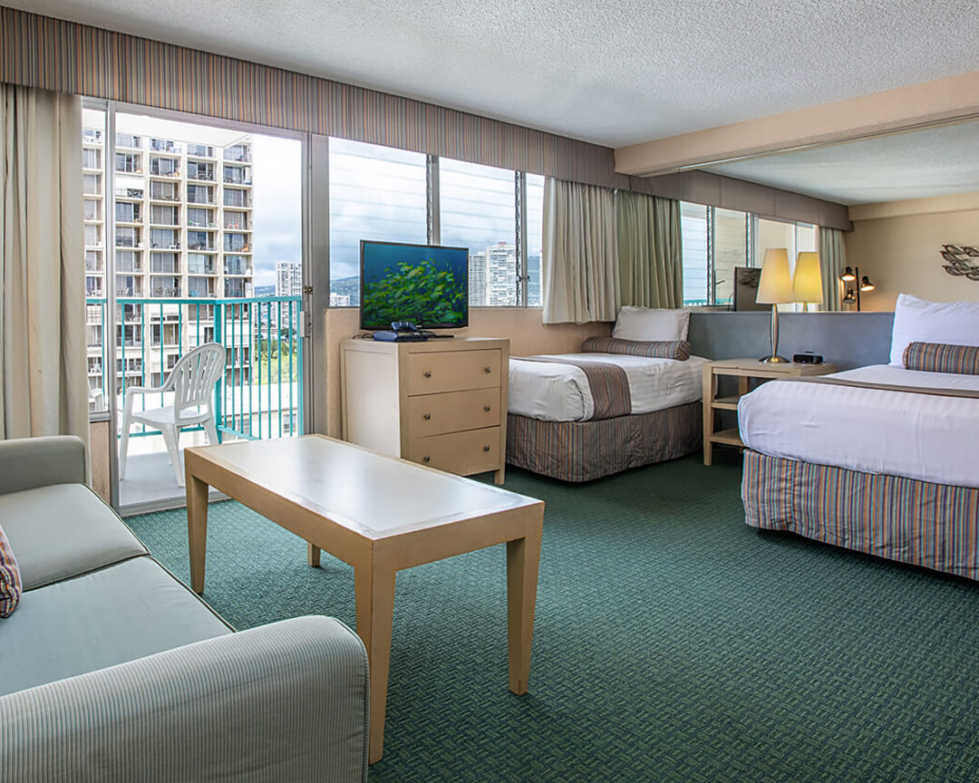 Room with bed, nightstand, lamp, balcony