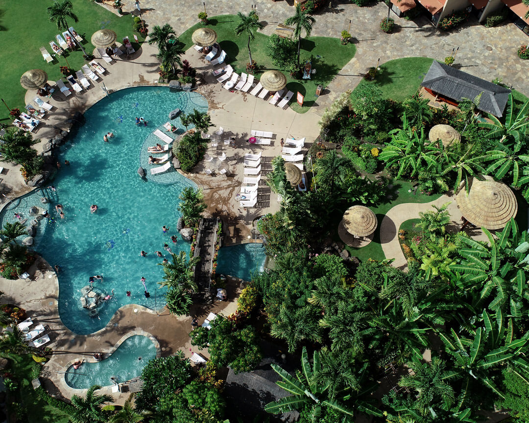 drone view of property grounds and pool.