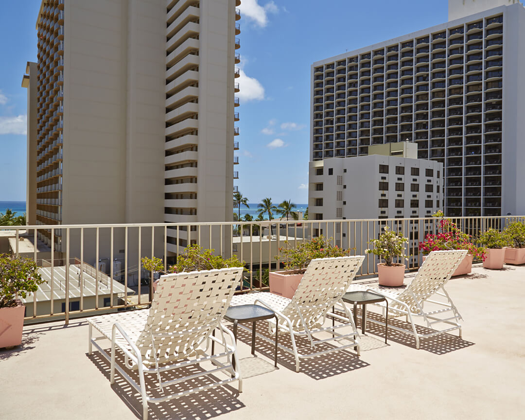 Rooftop sundeck with loungers.