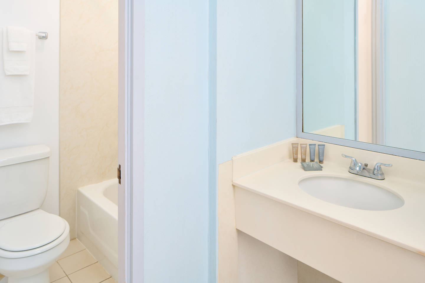 Bathroom in studio with balcony bathroom.