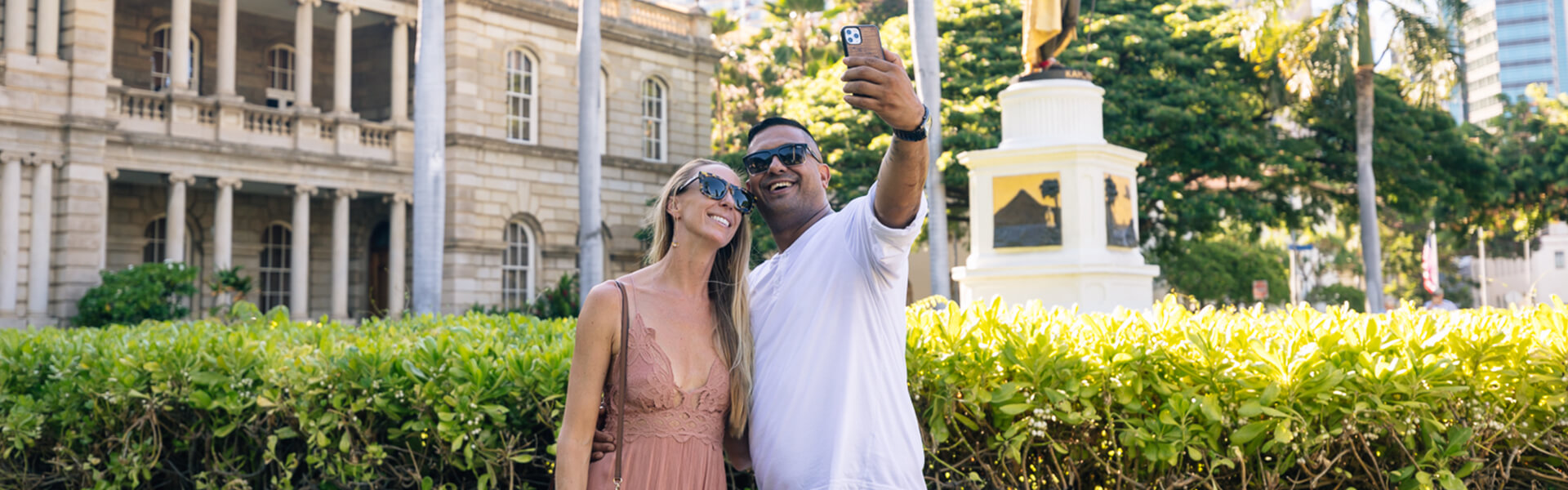 Couple walking through Downtown Honolulu