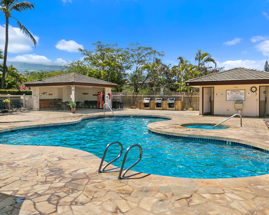 Outdoor swimming pool, hot tub, and sun deck.