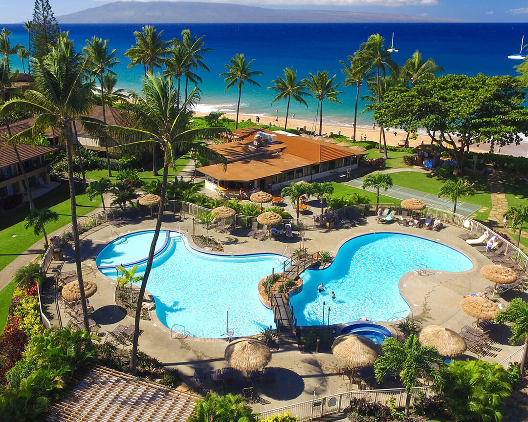 Overhead view of swimming pool and beach.