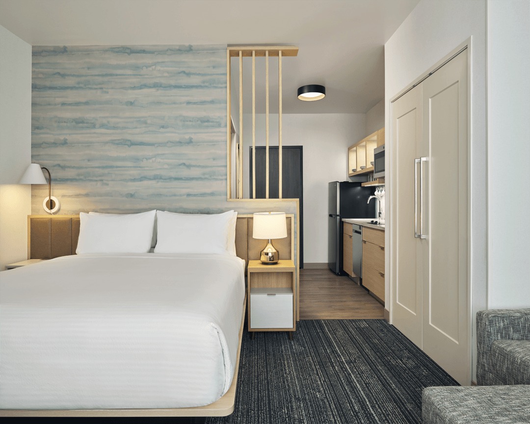 Bedroom with kitchenette.