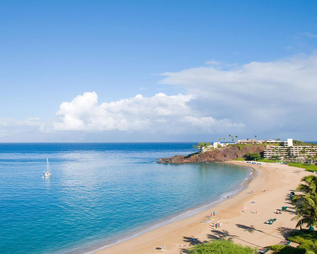 View of beach from balcony.